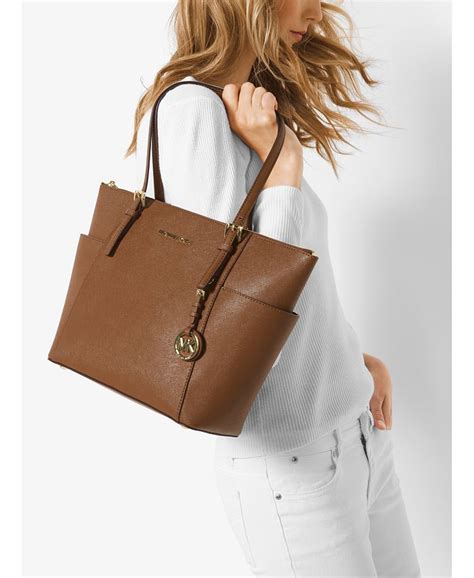 michael kors jet set east west top zip tote sale|Michael Kors saffiano tote.